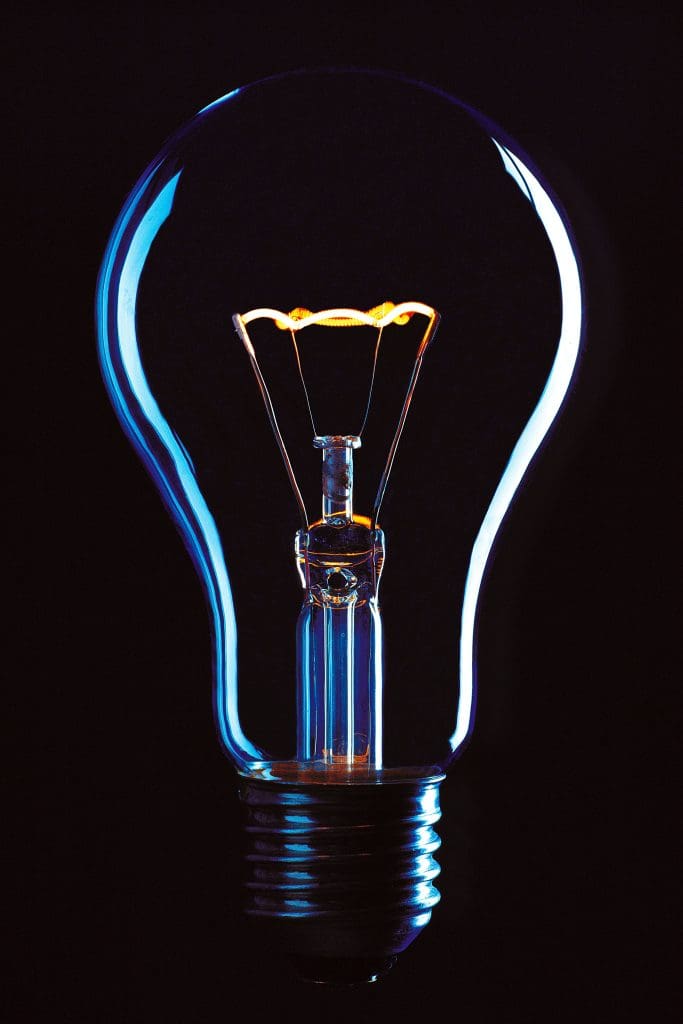 A lightbulb against a black background